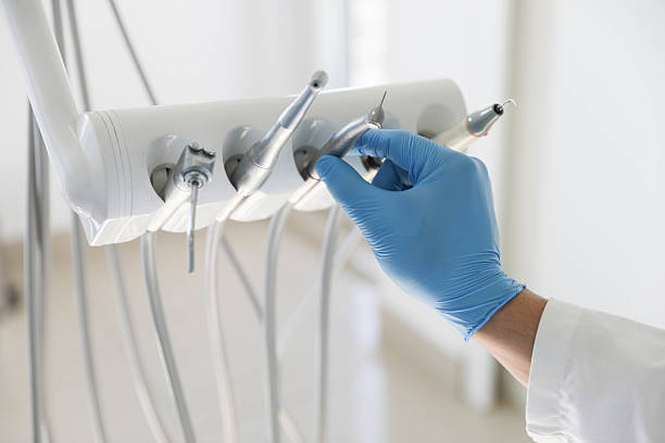 Professional Tooth Extraction technician working in Doolittle, TX